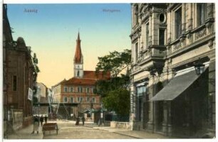 Aussig. Bielagasse mit Turm der Dekanatskirche Mariä Himmelfahrt und Eisenbahnüberführung