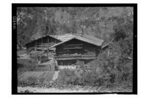 Bauernhof in den Alpen : Ein Bauernhof in den Alpen, um 1910