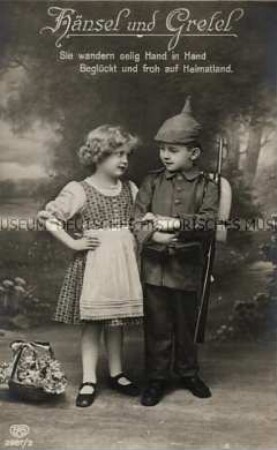 Mädchen und Junge in Uniform, mit Vers