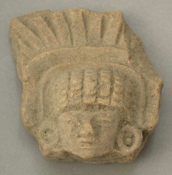 Clay head (fragment)