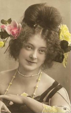 [Frau mit bunten Blumen im Haar]