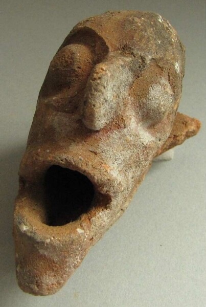 Clay head (vessel fragment)