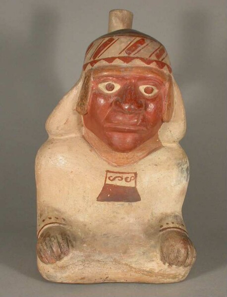 Seated anthropomorphic figure